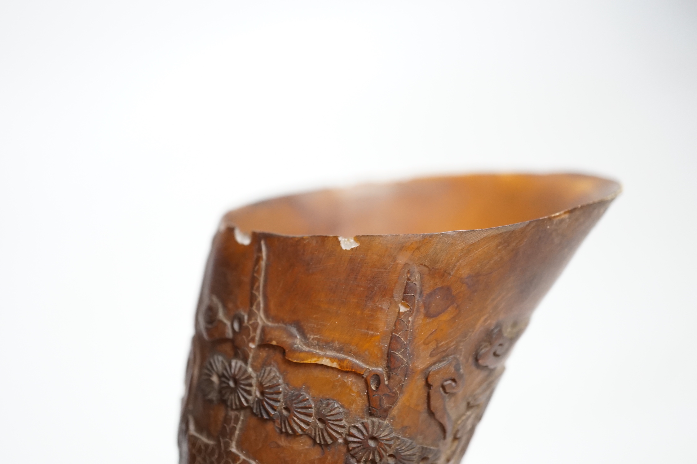 A Chinese carved horn cup 13cm